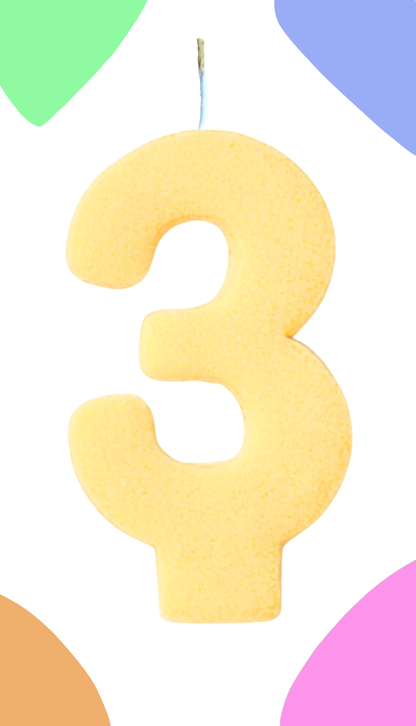 Yellow number 3 candle on a white background with colorful circles around it