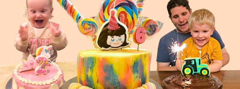 Colorful birthday cakes with a number 6 candle, surrounded by children and adults, with a unicorn and tractor cake visible.