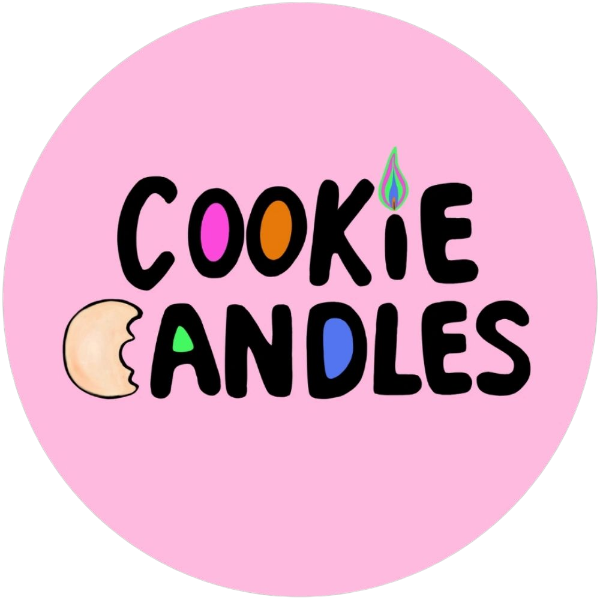 Round pink sticker with 'Cookie Candles' text and colorful graphics on a white background