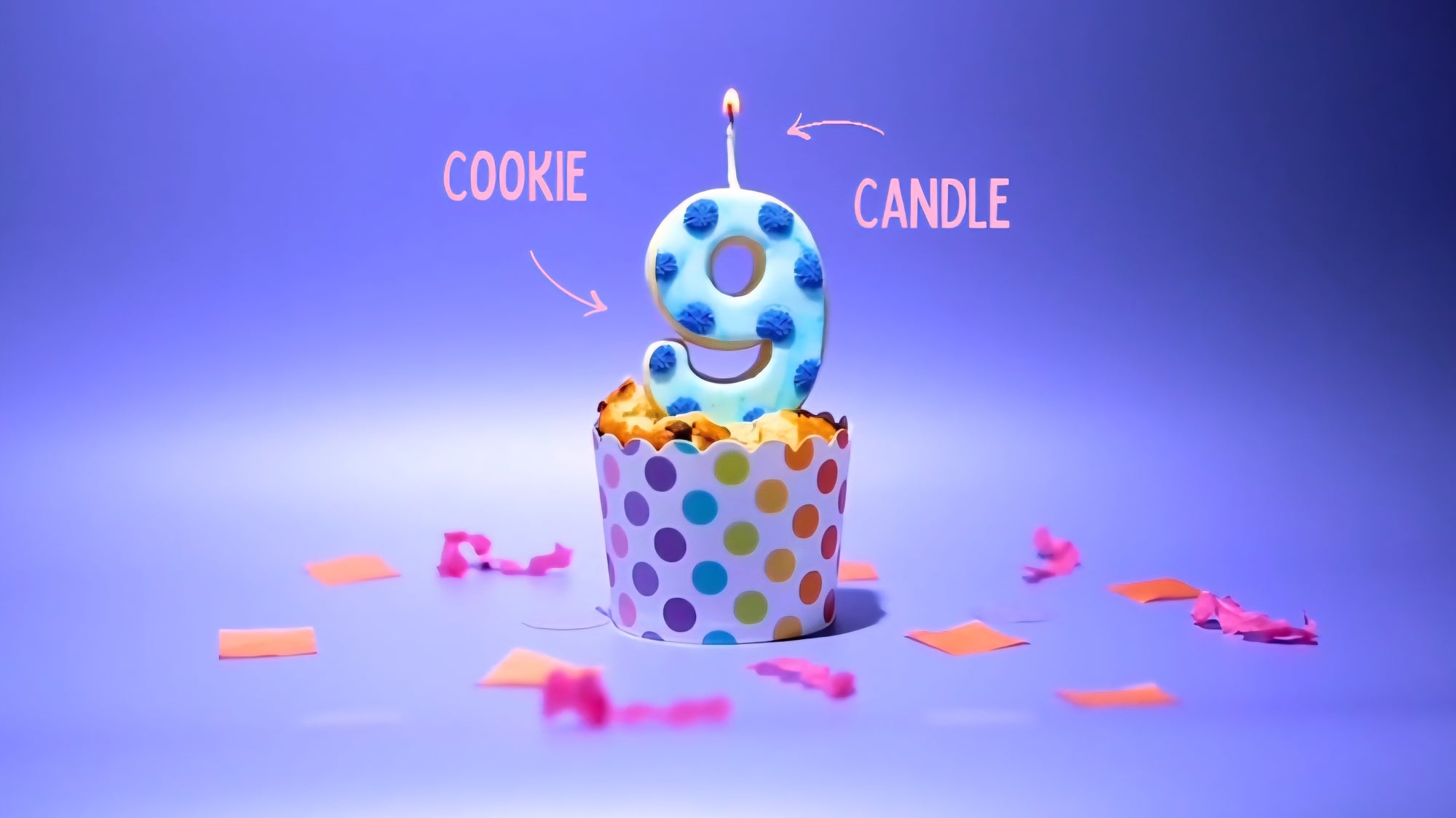 Birthday cake with a cookie-shaped candle on a purple background