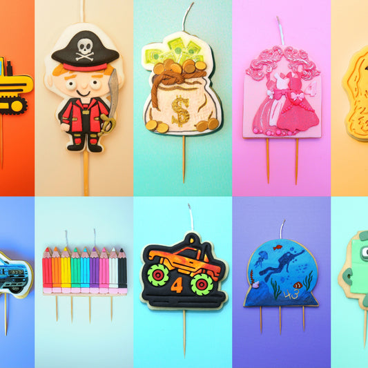 Collection of colorful edible cookie birthday candles with various designs on a multicolored background