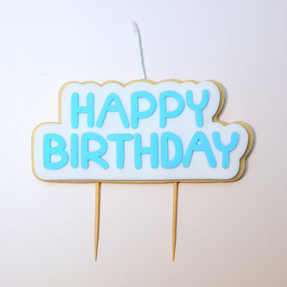 Happy Birthday Cookie Candle cake topper with blue text on a white background