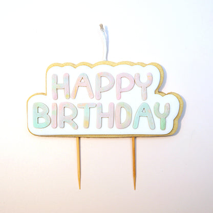 Multicoloured 'Happy Birthday' Cookie Candle on a white background