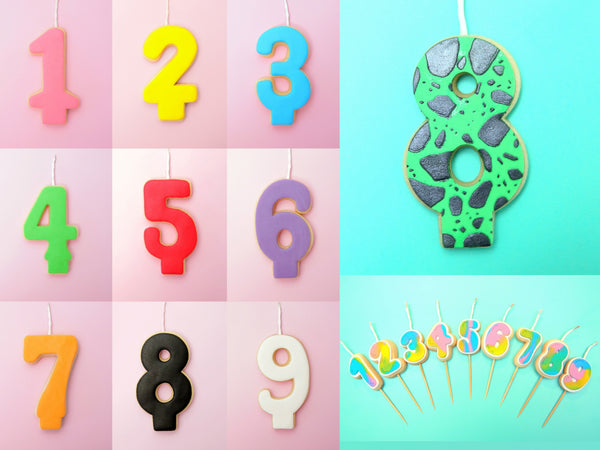 Colorful number candles on a pink and blue gradient background