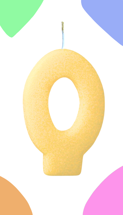 Yellow number '0' cookie candle on a colorful background